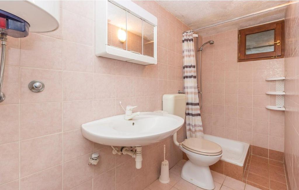 Apartmani Cizmesija Tkon Exterior foto